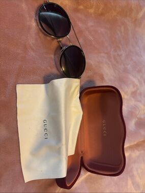 Authentic Gucci Round Sunglasses in Black with Burgundy Case and Cream Pouch